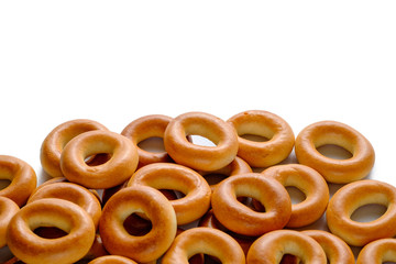 Heap of bagels isolated on white background.