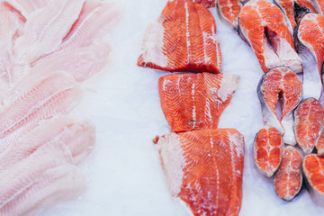 salmon cool fish in ice. sea food. grocery shopping. soft focus