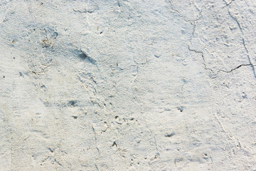 White stucco rough background with rough surface - grunge texture