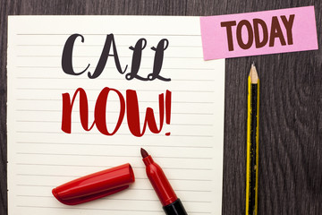Writing note showing  Call Now. Business photo showcasing Contact Talk Chat Hotline Support Telephony Customer Service written on Notebook Paper on the Wooden background Today Marker Pencil.