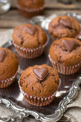 Chocolate muffins with chocolate chips and chocolate heart