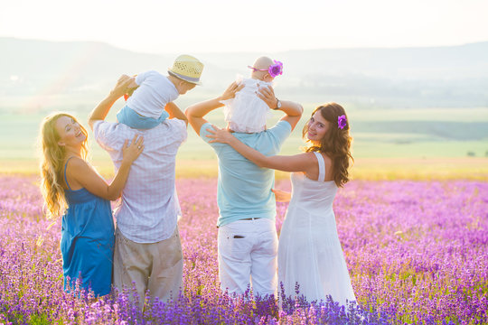 Two friendly family in a lavender field