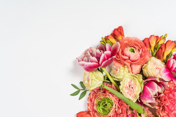 Floral pattern made of pink and beige roses, green leaves, branches on white background. Flat lay, top view. Valentine's background. Floral pattern. Pattern of flowers. Flowers pattern texture