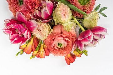 Floral pattern made of pink and beige roses, green leaves, branches on white background. Flat lay, top view. Valentine's background. Floral pattern. Pattern of flowers. Flowers pattern texture