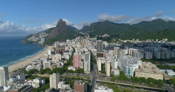Aerial view above Ipanema Beach city district and Two Brother Mountains in the distance. Rio de Janeiro, Brazil