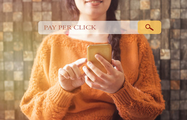 woman with beautiful smile and a braid hair and browsing pay per click in the search bars