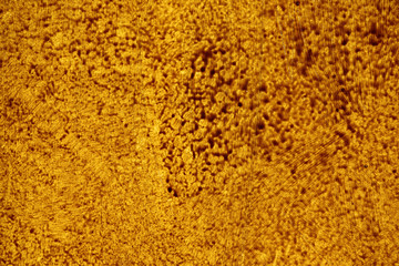 gold brown background paper with vintage grunge background texture with black scuffed edges and old...