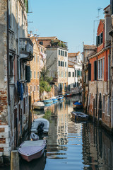 Colourful and relaxing canal in Venice, Veneto, Italy.