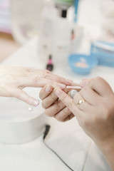 Obraz na płótnie Canvas manicure in a beauty salon