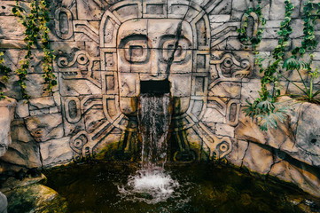 Traditional national indian totem.  Totem pole sculpture art. Ancient wooden mask.  Mayan and...