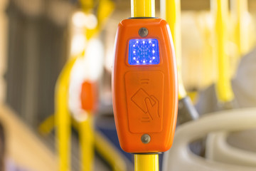 Modern prepaid public transport ticketing system, payment by bank cards, with validation machine at...