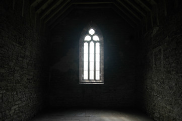Generic church window with light streaming through - Powered by Adobe