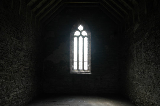 Generic church window with light streaming through