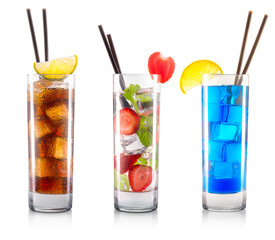 Set of cocktails in classical glasses with slice of lemon, strawberry and black straw isolated on white background with clipping path