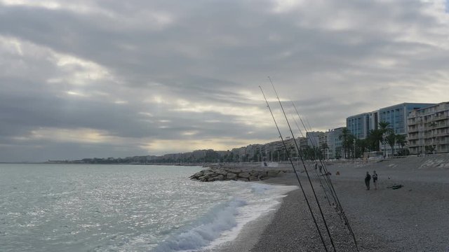 Fshing rods fixed on a beach 