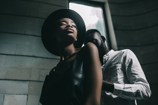Strong love connection. African American couple. Young fashionable people, unrecognizable black male, stylish concept