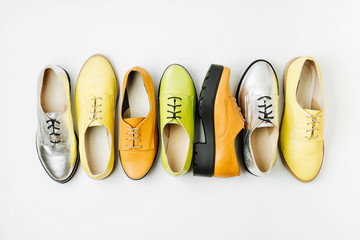 Stylish female spring or autumn shoes in various colors. Beauty and fashion concept. Flat lay, top view