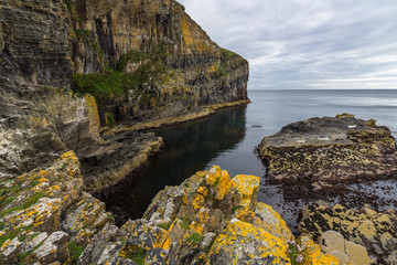Scenic seascape at the bottom of Whaligoe Steps, Caithness, Scotland, Britain