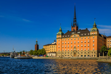 Fototapeta premium View onto Stockholm old town Gamla Stan and Riddarholmen church in Sweden