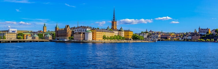 Fototapeta premium Panoramic view onto Stockholm old town Gamla Stan and Riddarholmen church in Sweden