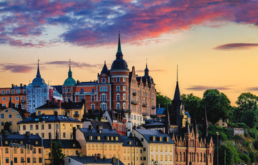 Fototapeta premium View onto the gothic buildings of old town Stockholm in Sweden at sunset