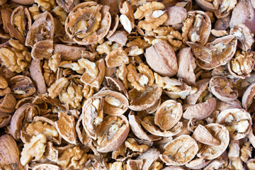 Walnuts with broken nutshells. Not yet husked.
