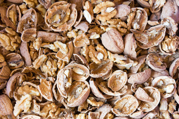 Walnuts with broken nutshells. Not yet husked.
