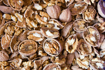 Walnuts with broken nutshells. Not yet husked.