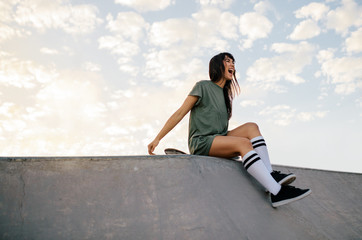Woman enjoying a day at skate park © Jacob Lund