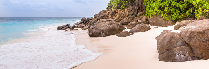 Seychelles, Paradise beach. La Digue at Anse Lazio, Source d’Argent. Background.