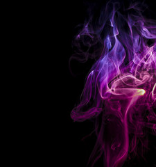 Colored smoke on black background