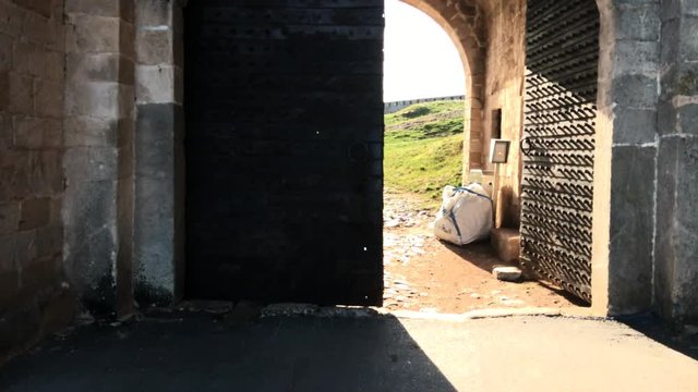  Gates of ancient castle stone structure footage - POV walking to old fortified wall