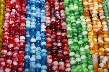 colorful glass beads on the souvenir shop shelf