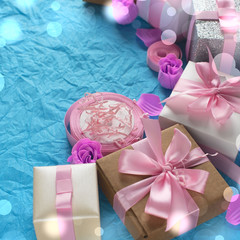 Decorative festive background with gift boxes.