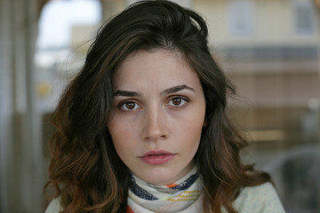 Woman portrait; close up portrait of young woman.