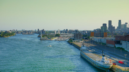 Fototapeta premium View of old port area with large ship, middel of the summer, Montreal, Canada