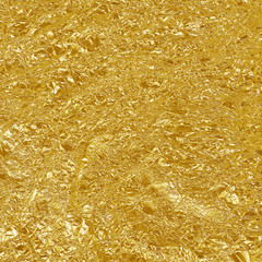 Gold foil leaf shiny texture, abstract yellow wrapping paper for background and design art work.