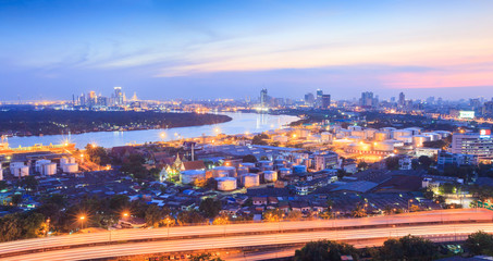 Chao Phraya River, Bangkok port and Bangkok skyline at twilight.
