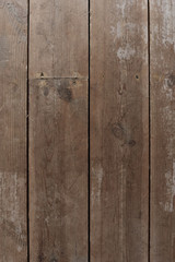 Closeup of dark brown wooden board textured background