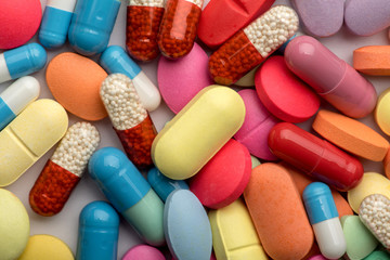 Pharmacy theme. Multicolored Isolated Pills and Capsules.