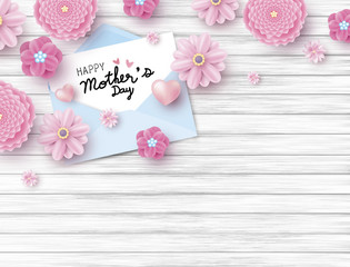 Fototapeta na wymiar Happy mothers day on white paper in envelope and pink flower with heart on wood texture background with copy space vector illustration