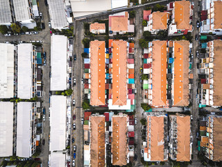 Colorful house roofs in dense, top view