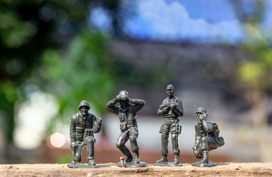 Close up image of  toy military army on battle field