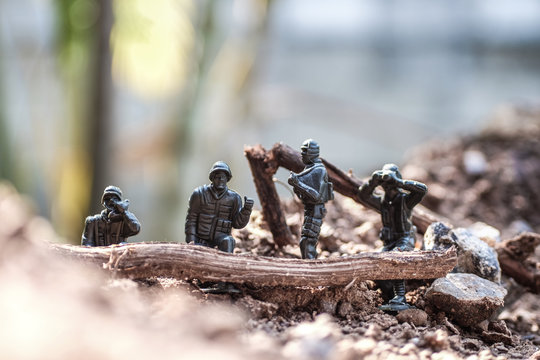 Close up image of  toy military army on battle field