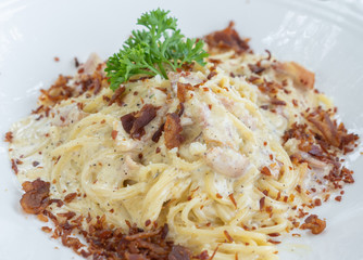 Spaghetti Carbonara on a wood table