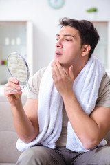 Man preparing to shave at home
