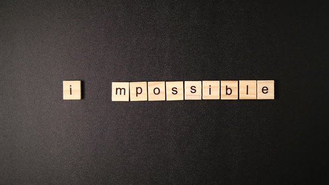 Changing words "Impossible" to "I'm possible" by hand