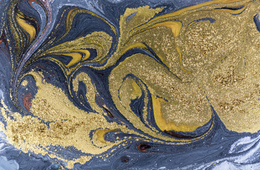 Marble abstract acrylic background. Nature marbling artwork texture with golden glitter