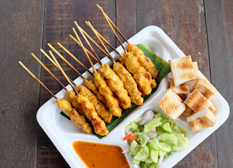 Pork satay, Grilled pork served with peanut sauce.