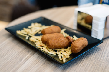 Close up of croquettes with potatoes